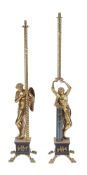 A pair of Continental gilt metal figural standard lamps