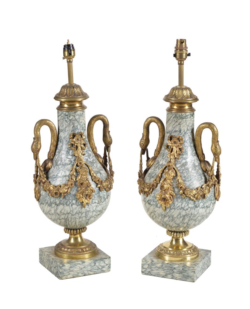 A pair of French marmo cipollino and gilt bronze mounted table lamps in Louis XVI taste