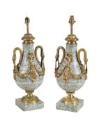 A pair of French marmo cipollino and gilt bronze mounted table lamps in Louis XVI taste