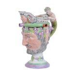 A Staffordshire pearlware Bacchus puzzle jug