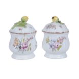 A pair of Chelsea porcelain baluster pomade-pots and covers