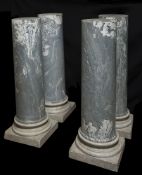 A set of four Italian marmo cipollino and white marble mounted columnar pedestals