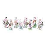 An assortment of Derby porcelain figures