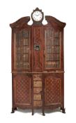 ϒ A French kingwood, parquetry inlaid, and gilt metal mounted cabinet