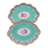 A pair of Derby porcelain lozenge shaped turquoise ground serving dishes painted with pink roses by