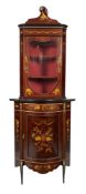 A mahogany and marquetry inlaid corner cabinet