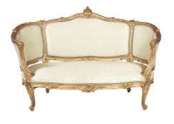 A giltwood canape in Louis XVI style