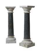 A pair of verde antico and white marble mounted columnar pedestals