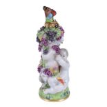 A Charles Gouyn St. James's factory type scent bottle and stopper of Bacchic putti with a faun