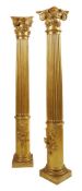 A pair of carved and giltwood columns