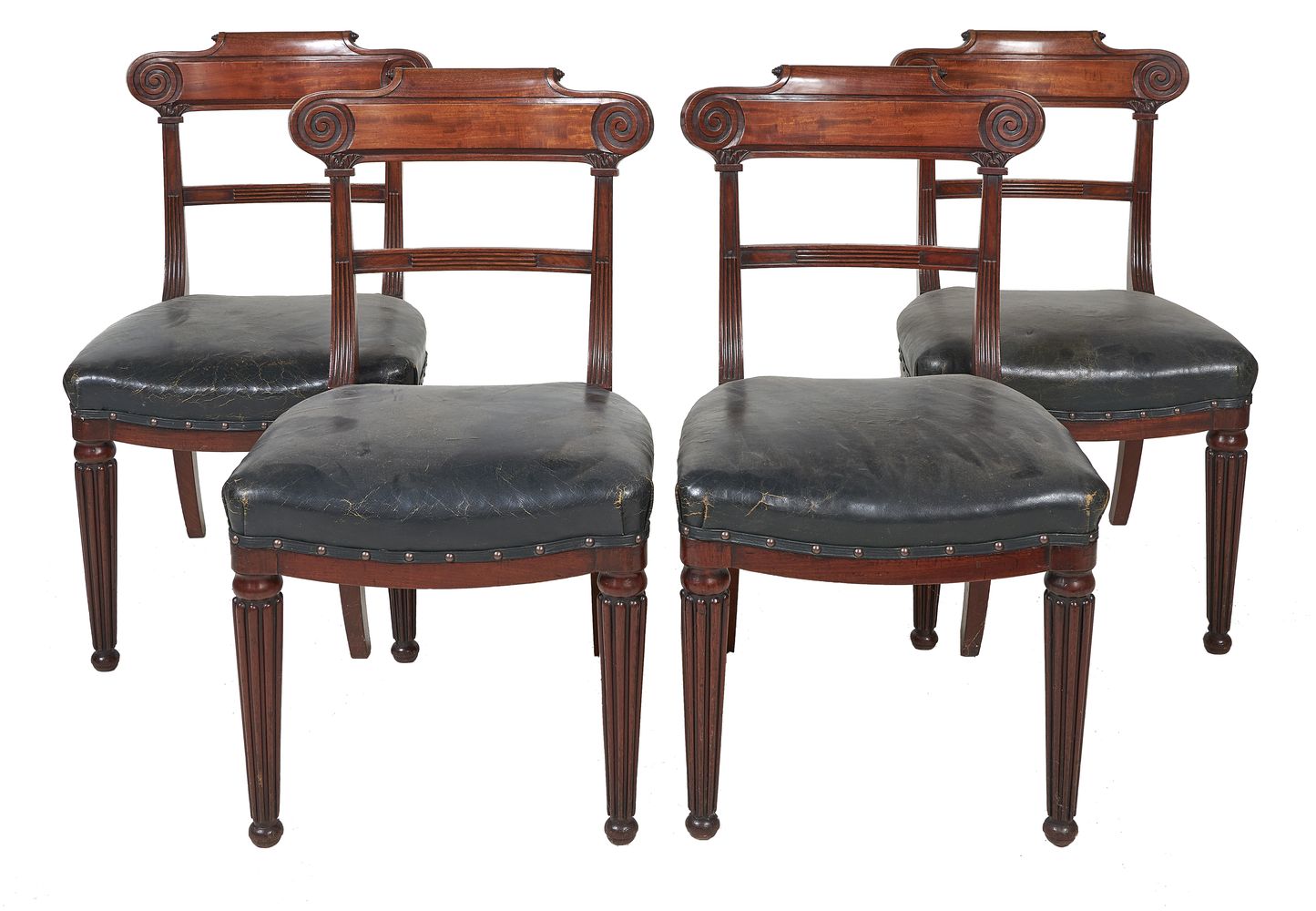 A set of six George IV mahogany and leather upholstered dining chairs