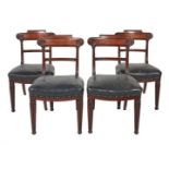 A set of six George IV mahogany and leather upholstered dining chairs