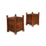A pair of George III style chestnut jardinieres, in the Gothic style