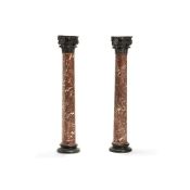 A pair of Continental Belge marble columnar pedestals, late 19th century