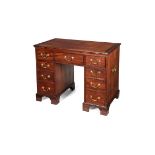 A George III mahogany architect's kneehole desk, circa 1780