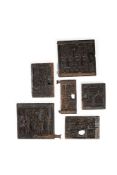 Six various carved and stained oak panels, probably French, late 15th and early 16th century