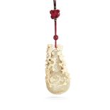 ϒ A Chinese pierced ivory double gourd ivory pomander, Qing Dynasty, 19th century