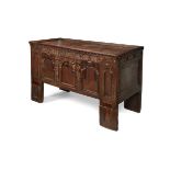 A 17th century style carved oak coffer