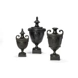 Three James Neale dry-bodied stoneware black basalt urns, circa 1776-8