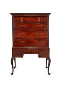 A George III mahogany chest on later stand