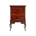 A George III mahogany chest on later stand