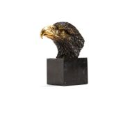 A gilt and patinated bronze model of an eagle's head, 20th century