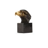 A gilt and patinated bronze model of an eagle's head, 20th century