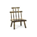 A primitive painted ash Windsor chair of low height