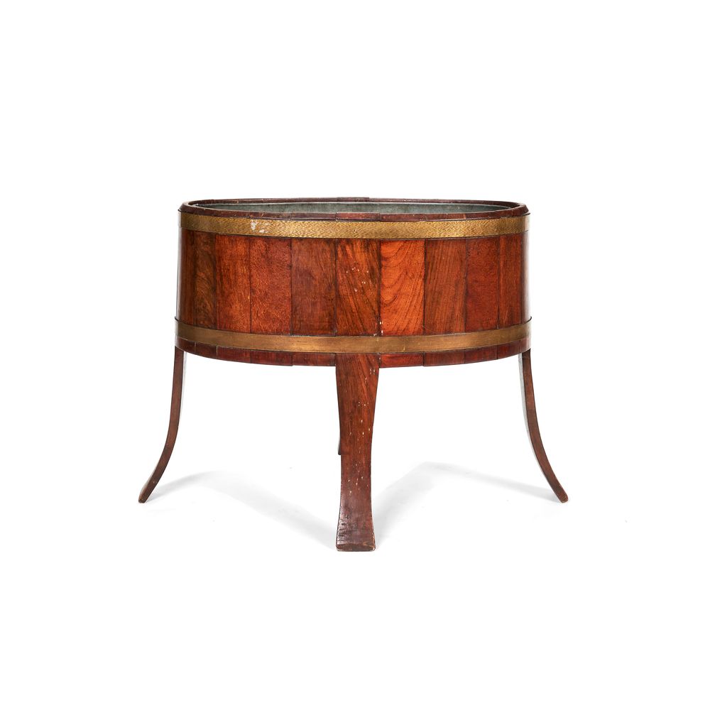 An Edwardian teak and brass-bound jardinière stand, early 20th century