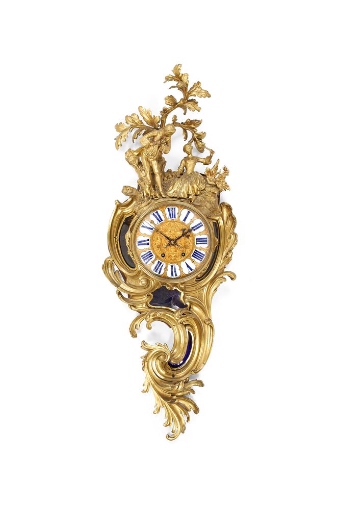 An impressive French Louis XV style gilt brass cartel clock, inscribed for Payne and Company, London