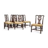 A set of six George III carved mahogany dining chairs, circa 1760