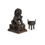 A Chinese bronze Buddhist lion on stand, Qing Dynasty, 19th century