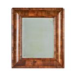 A William and Mary walnut 'cushion' framed mirror, late 17th century