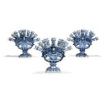 A set of three Dutch Delft blue and white tulipieres, late 19th century