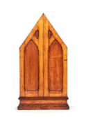 A Victorian Gothic oak table cabinet, circa 1860