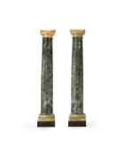 A pair of Italian or French verde antico columnar pedestals, first half 19th century
