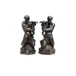A pair of Wedgwood black basalt Triton candlesticks, late 18th or early 19th century