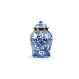 A large Chinese blue and white 'Temple' jar and cover, Qing Dynasty, 18th century