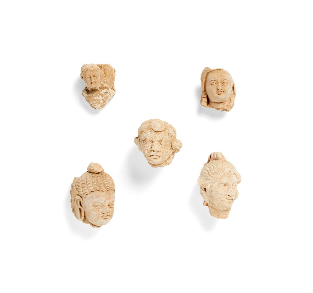 A group of five Gandhara stucco heads