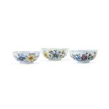 Three English delft polychrome punch bowls of Fazackerly type, third quarter 18th century