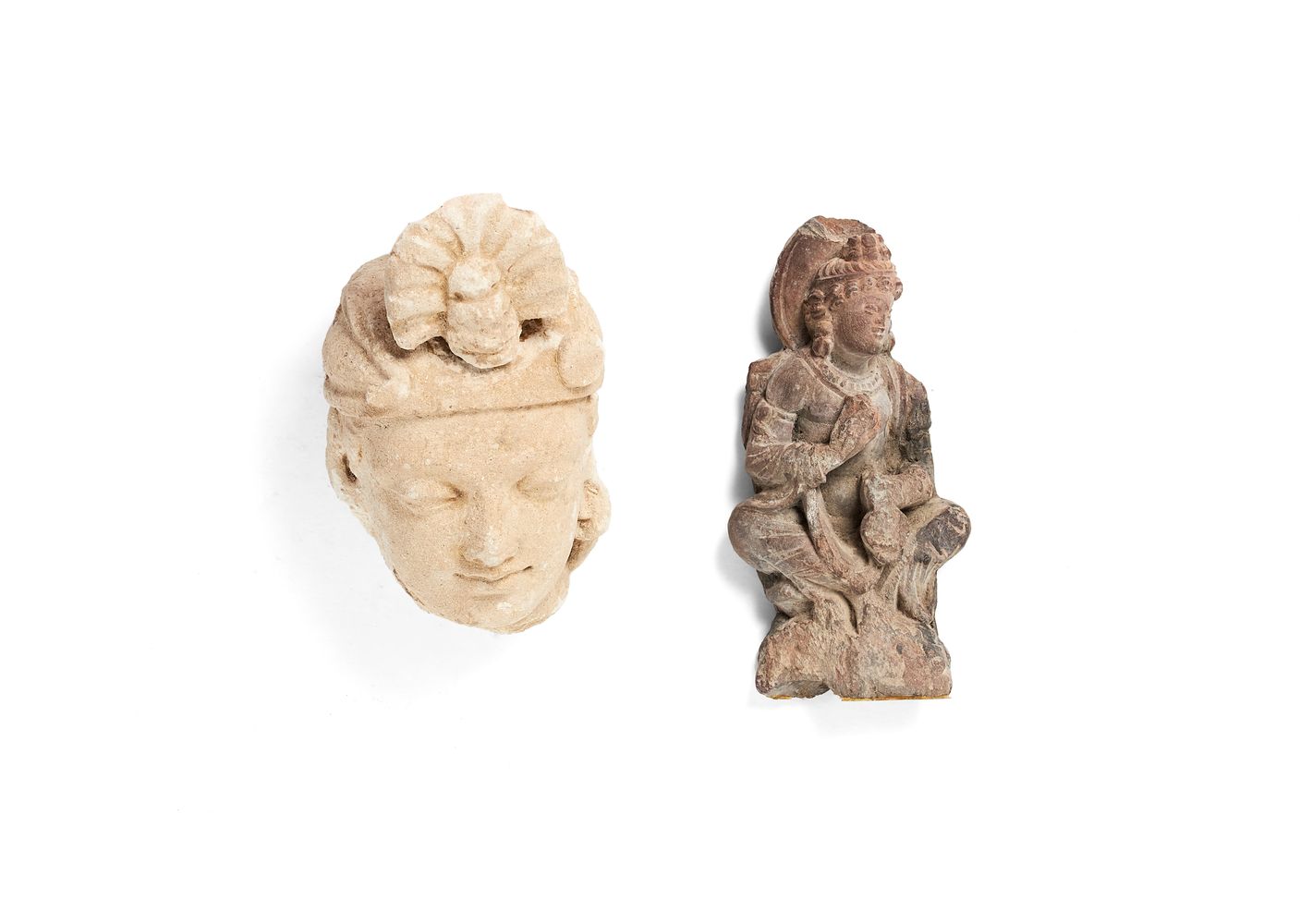 One Gandhara stucco fragmentary head of a Bodhisattva, 4th/5th century, and a Gandhara schist fragme