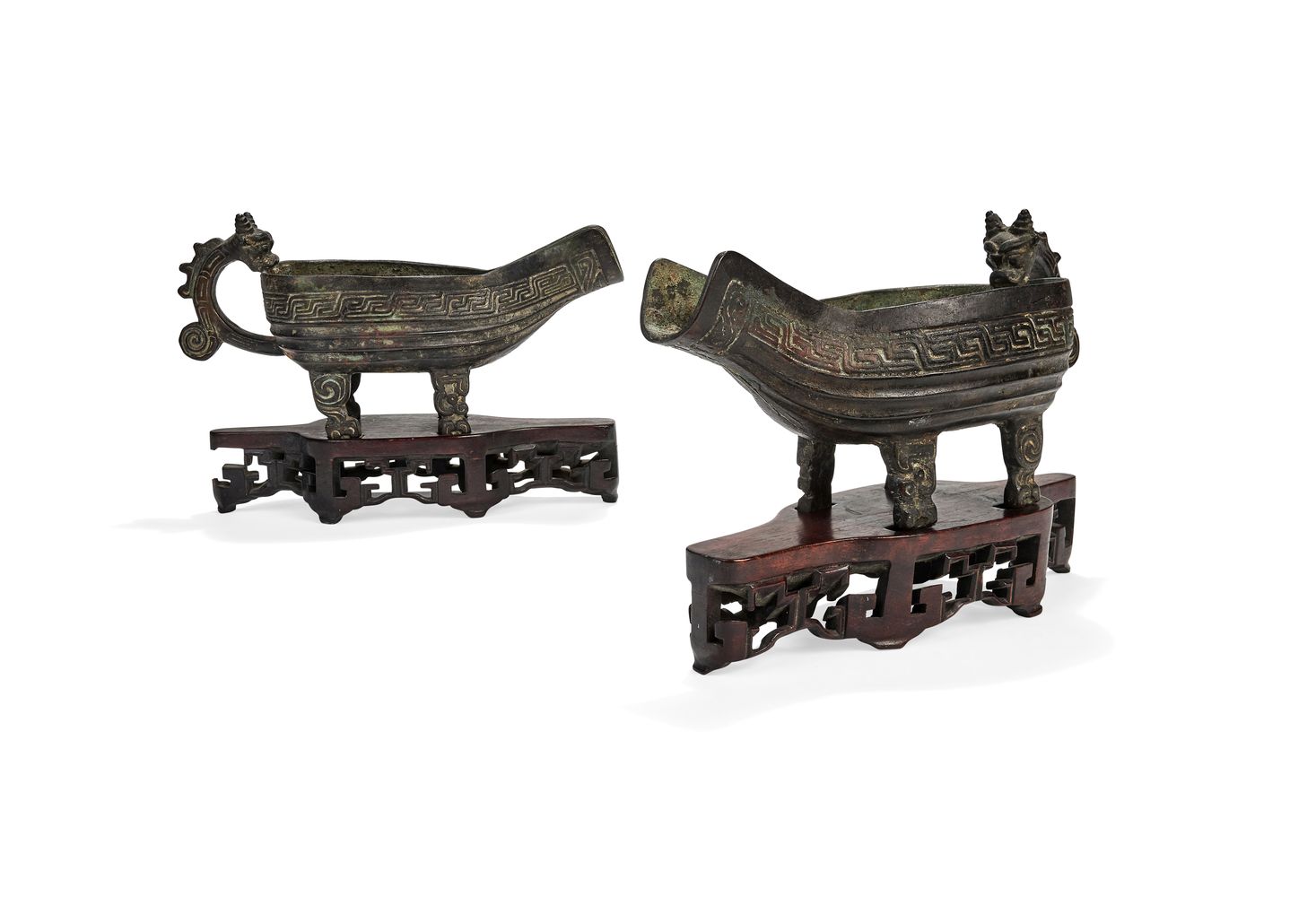 A pair of Chinese ritual bronze archaistic pouring vessels, Yi, Ming Dynasty, 17th century