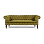 A Victorian walnut and button-upholstered chesterfield sofa