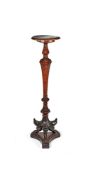 A carved walnut torchere, late 19th century