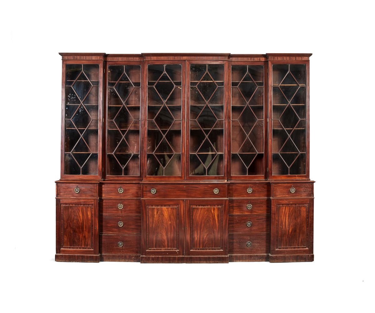 A George III mahogany breakfront library bookcase, circa 1790