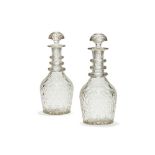 A pair of Continental cut glass magnum decanters and stoppers, 20th century