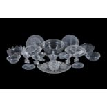 An assortment of cut glass dishes