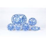 An assortment of Staffordshire blue and white printed pottery decorated with deer related subjects