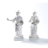 A pair of Royal Worcester biscuit porcelain Chinese figures modelled by A. Azori