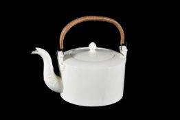 A English creamware punch kettle with wicker handle